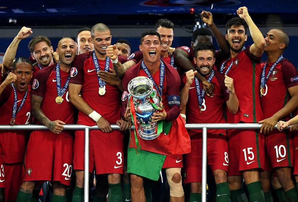 Cristiano Ronaldo lifting the Euro 2016 trophy