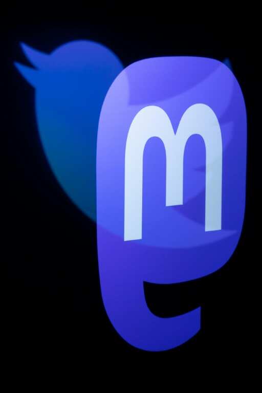 The Mastodon logo is seen here overlaying the Twitter logo