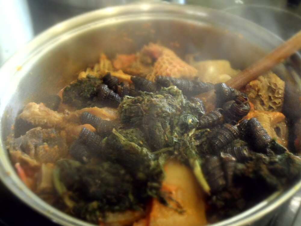 The process of cooking edikaikong The process of cooking edikaikong