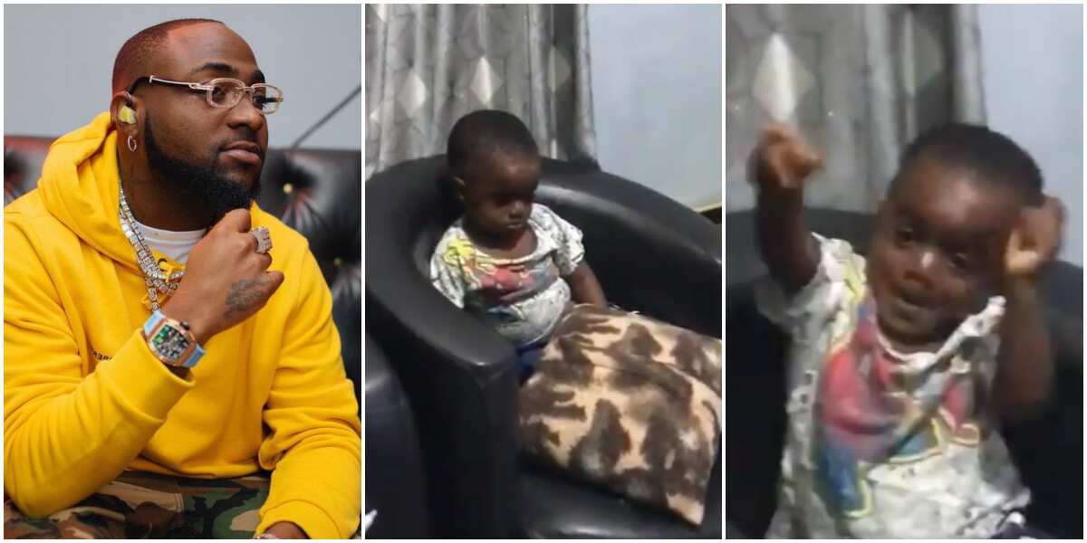 Hilarious moment little boy wakes up from sleep to dance immediately he heard Davido's FEM (video)