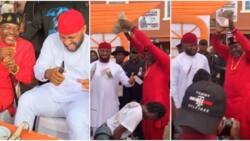 Sacrifice style: Actor Kanayo O. Kanayo rocks red outfit to event, heavily rains N1000 notes on Yul Edochie