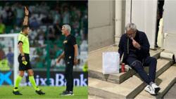 Mourinho sits on the floor to eat takeaway food outside stadium after referee issued him red card