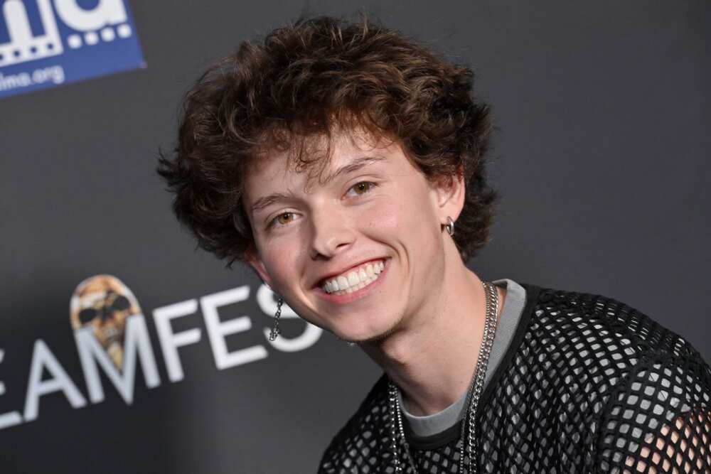Jacob Sartorius poses for a photo with a smile at TCL Chinese Theatre