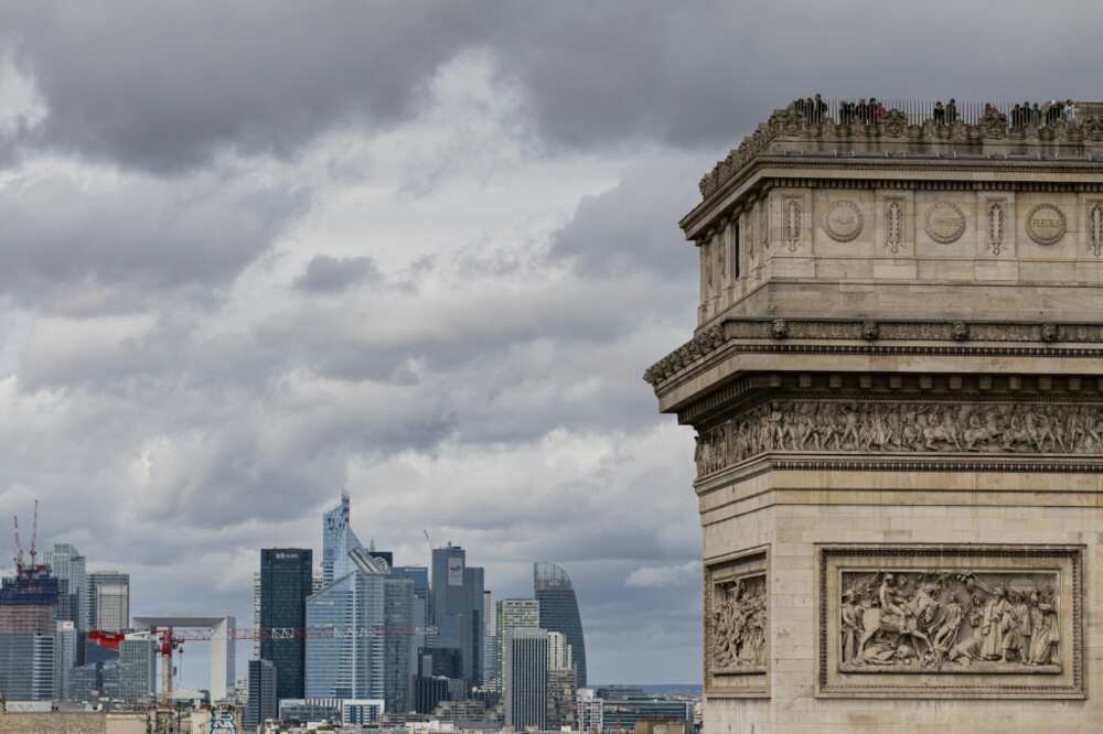 La Defense, the French capital's business district, seen behind the Arc de Triomphe in Paris