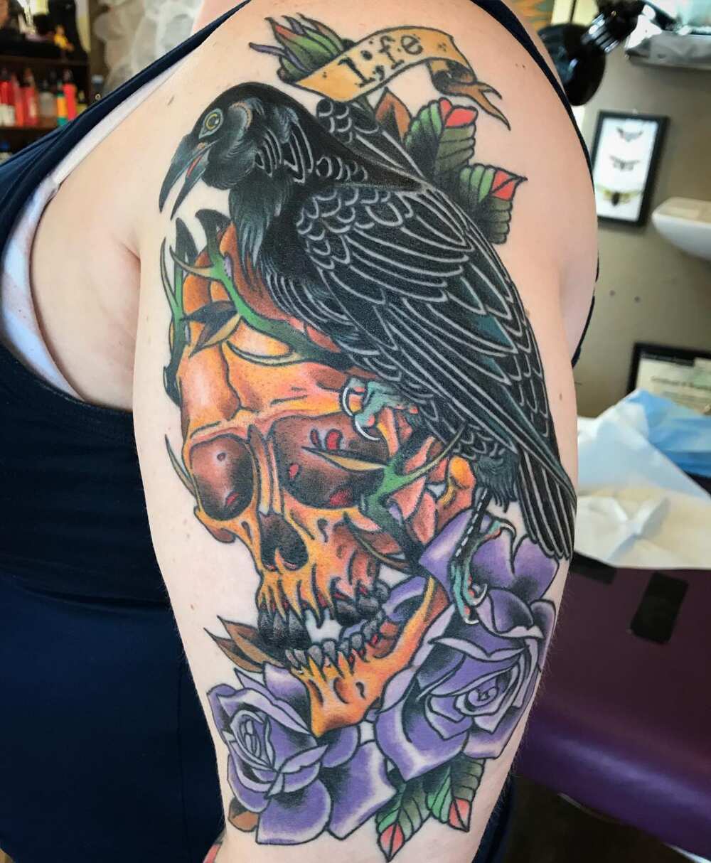 traditional raven head tattoo