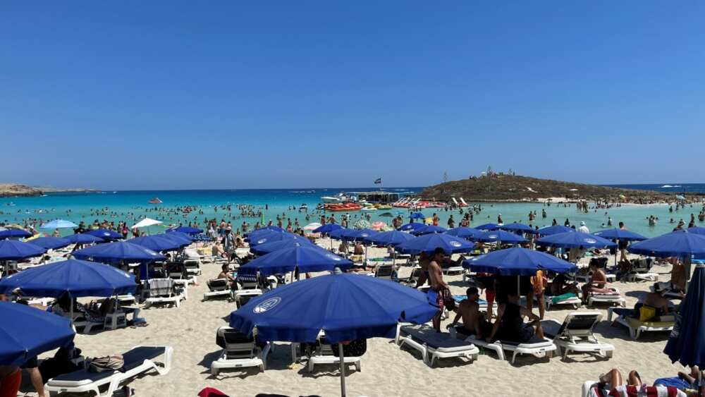 From January to June, Cyprus recorded 1.2 million visitors, nearly five times the level last year, and the white sand beaches at Ayia Napa are crowded with sunseekers and partygoers