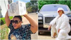 "I no dey carry load back home o": Dayo Amusa laments, shares photo of herself carrying rice on her head in US