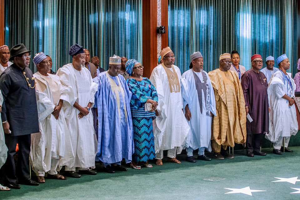 Buhari presides over swearing in ceremony of chairman, commissioners of FCSC