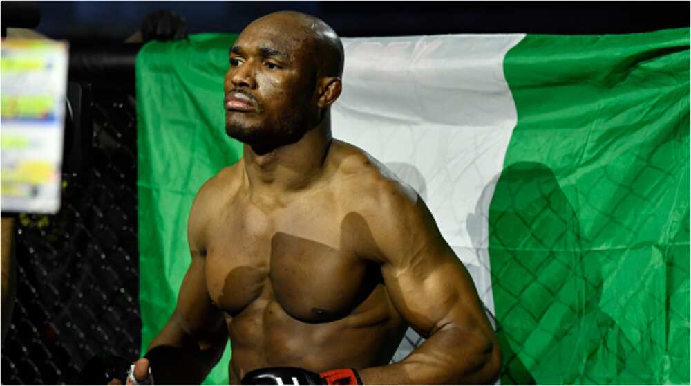 Watch hilarious moment Nigerian UFC champion Usman stopped press conference to receive congratulatory call