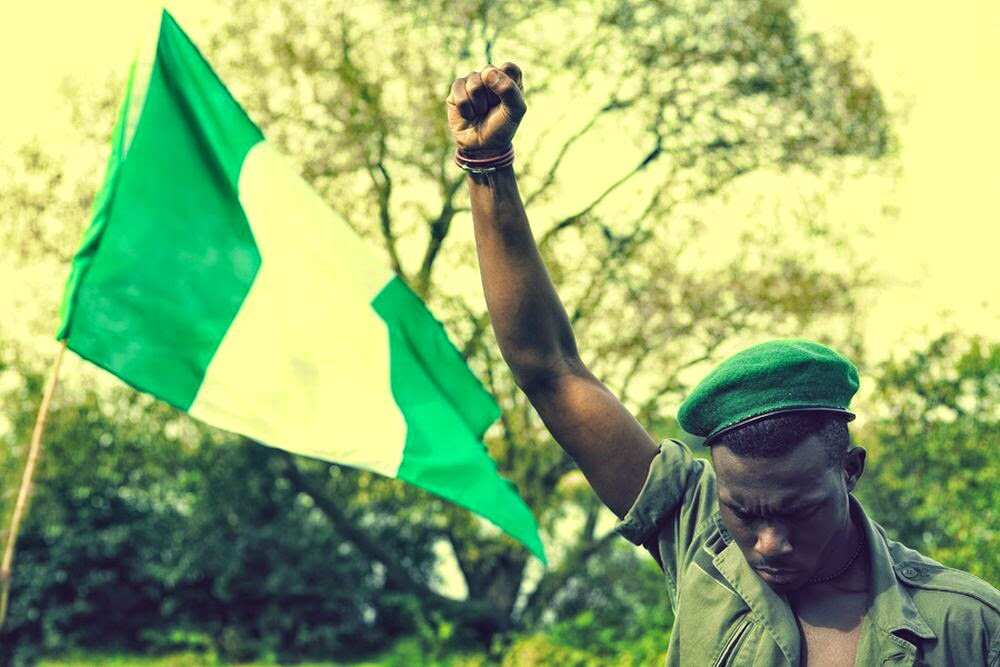 A Nigerian with a flag