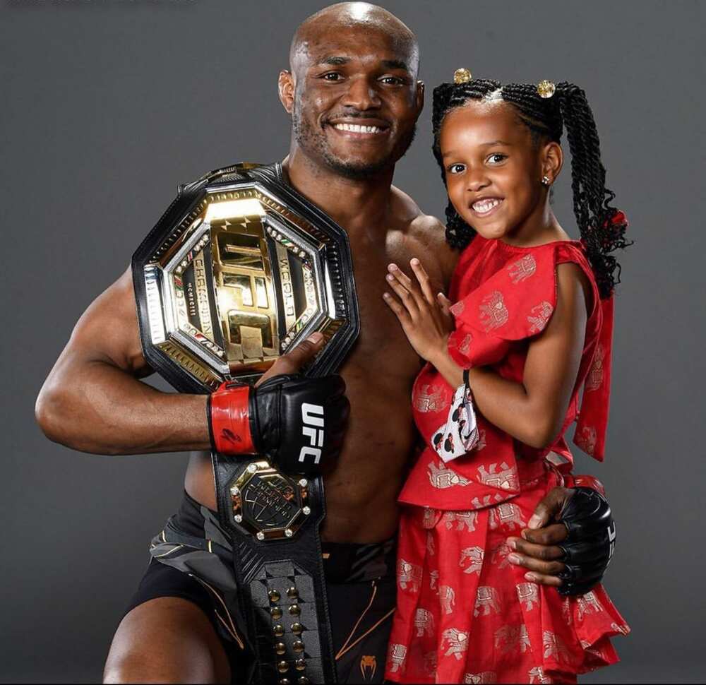 UFC champion Kamaru Usman trains with his 6-year-old daughter