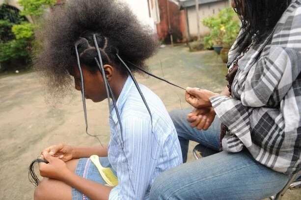 Thread hairstyles in Nigeria in process