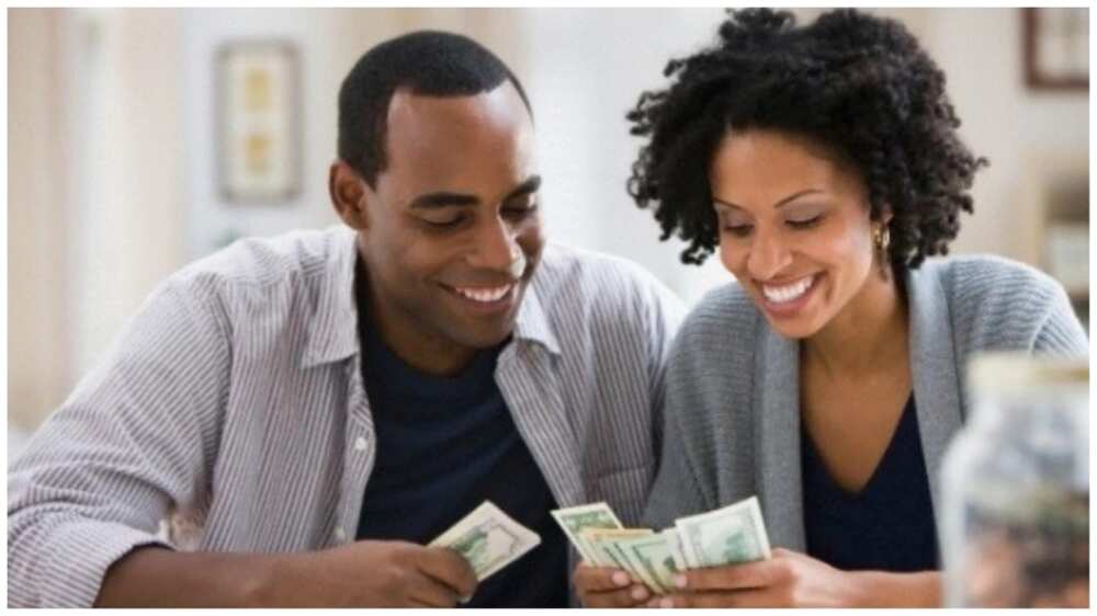 A man a woman with money