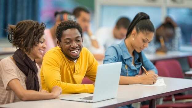 students in library