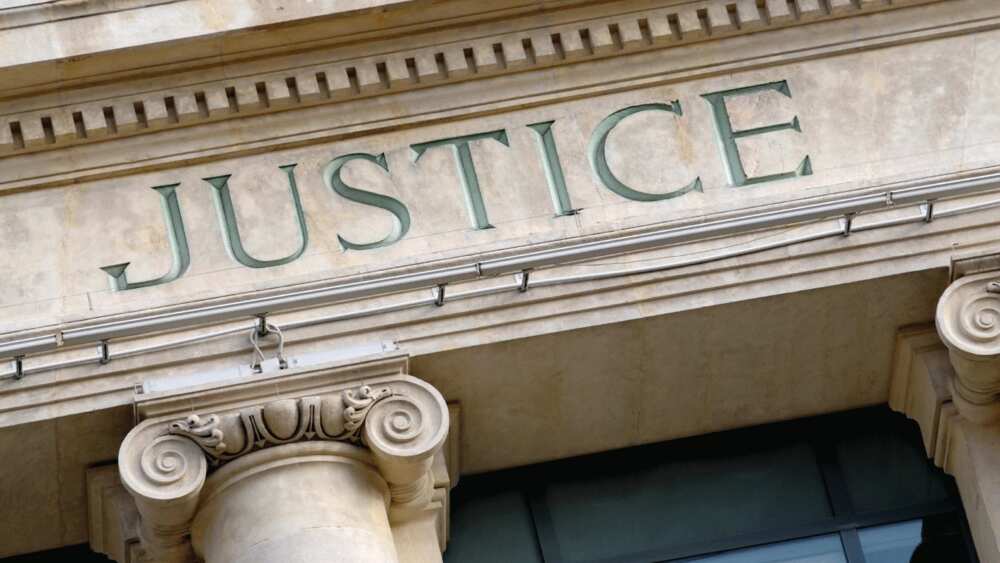 Justice sign on court building