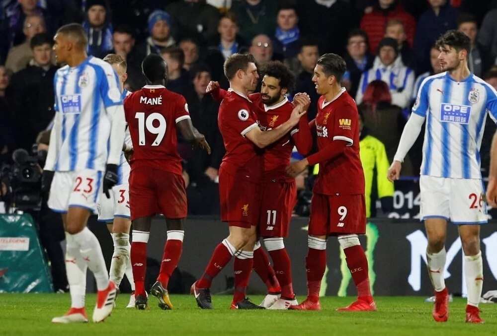 Liverpool cruise past helpless Huddersfield in entertaining Premier League encounter