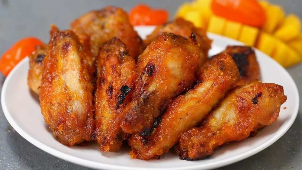 Chicken wings plus mango - top 10 Nigerian snacks and how to make them