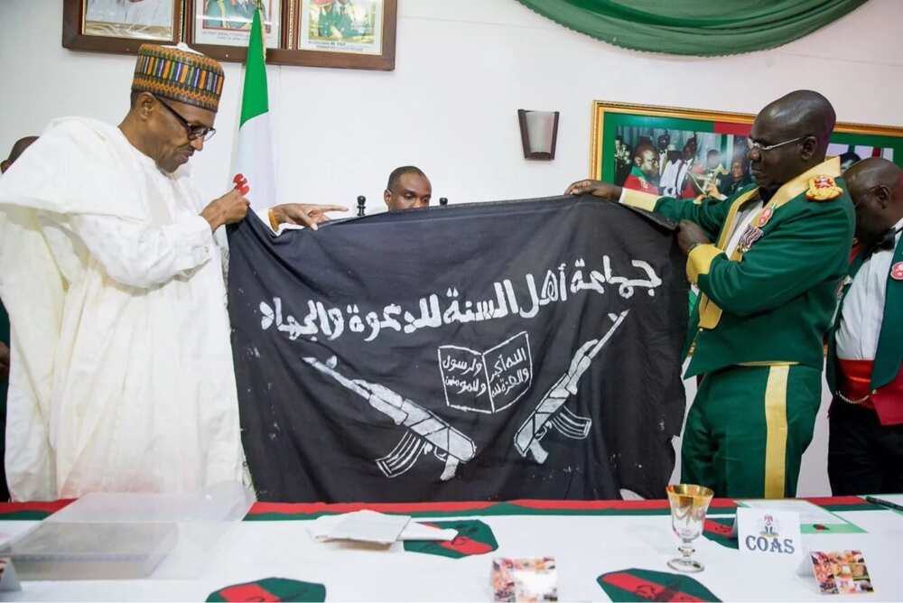 Buhari receives Boko Haram flag