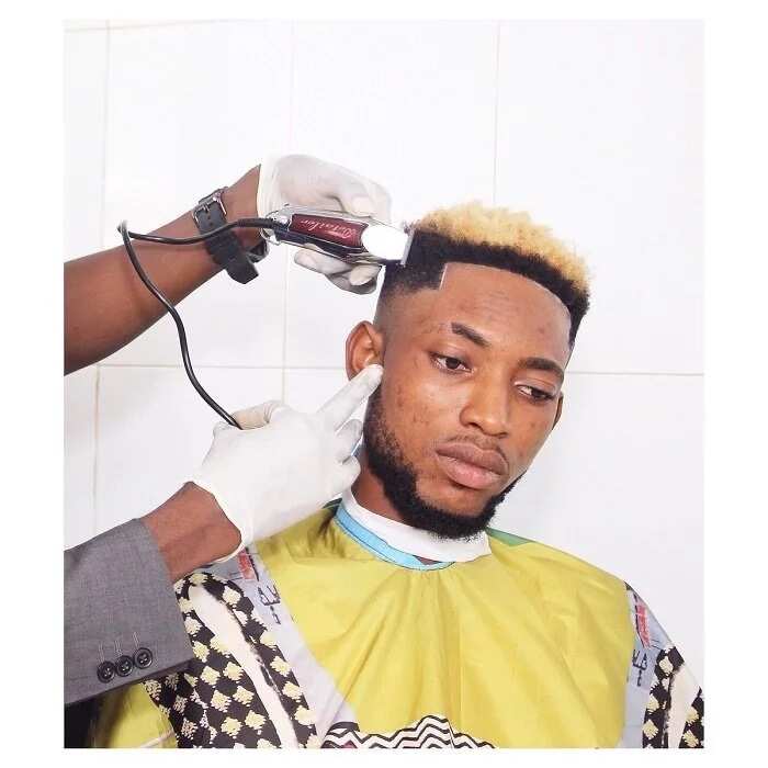 Meet Nigerian barber who can give you amazing haircuts (photos)