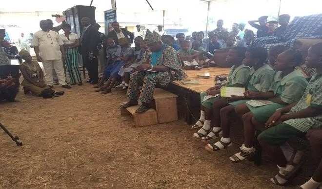 Obasanjo Back to School? 80-year-old Ex-president Seen in Reading Session with School Children (Photo)