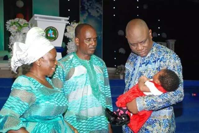 Pastor who welcomed baby after 32 years of childlessness dedicates him to God (photos)