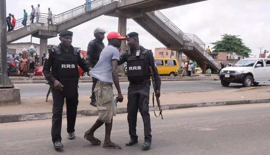 Police maintains law and order at Ojota pedestrian bridge