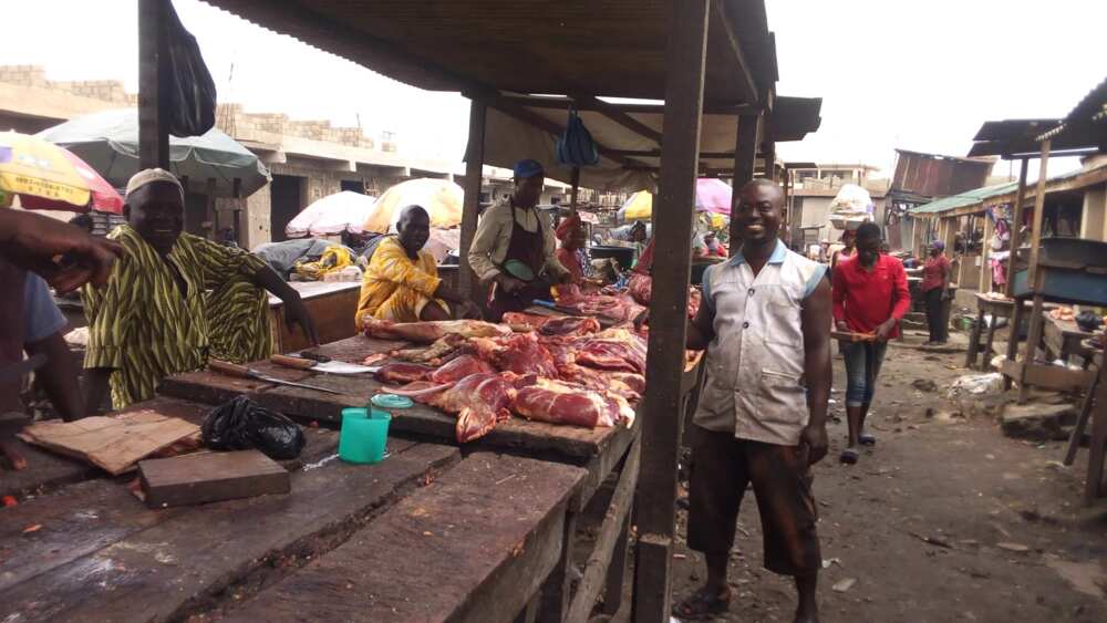 Meat sellers sitting idle at Ijora 7 UP market, Lagos. Source: Esther Odili.