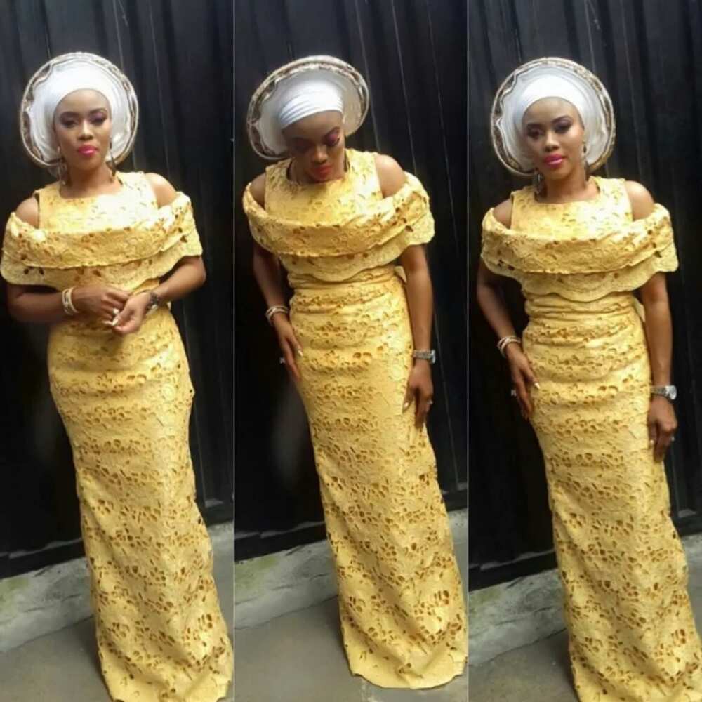 Aso Ebi lace styles with drapery in décolleté area