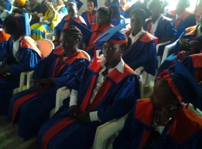 Nigerian single father celebrates his daughter who graduates from junior school (photos)