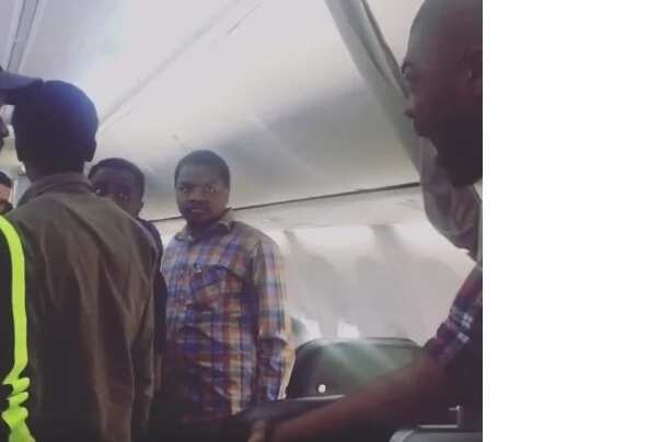 Nigerian lady kicked off Turkish flight for assaulting air hostess (photos, video)