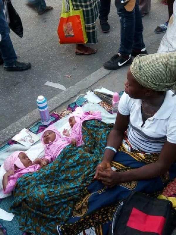 Sad! Woman and her new-born triplets beg on the Street of Port-Harcourt (Photos)