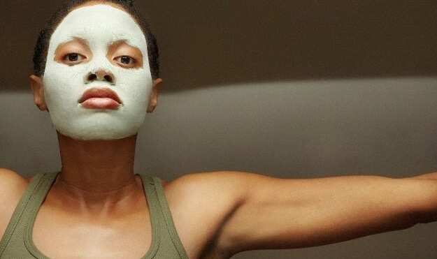 woman with clay mask