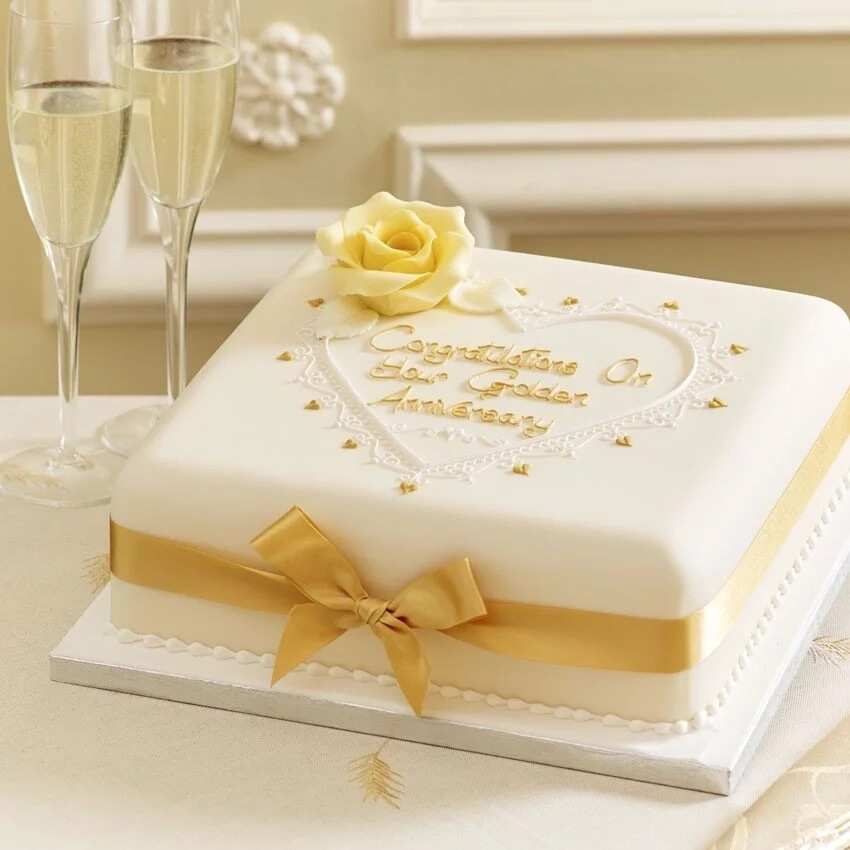 Golden wedding anniversary cake with names