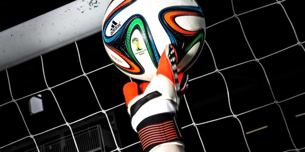 Goalkeeper hand catching ball Goalkeeper hand catching ball