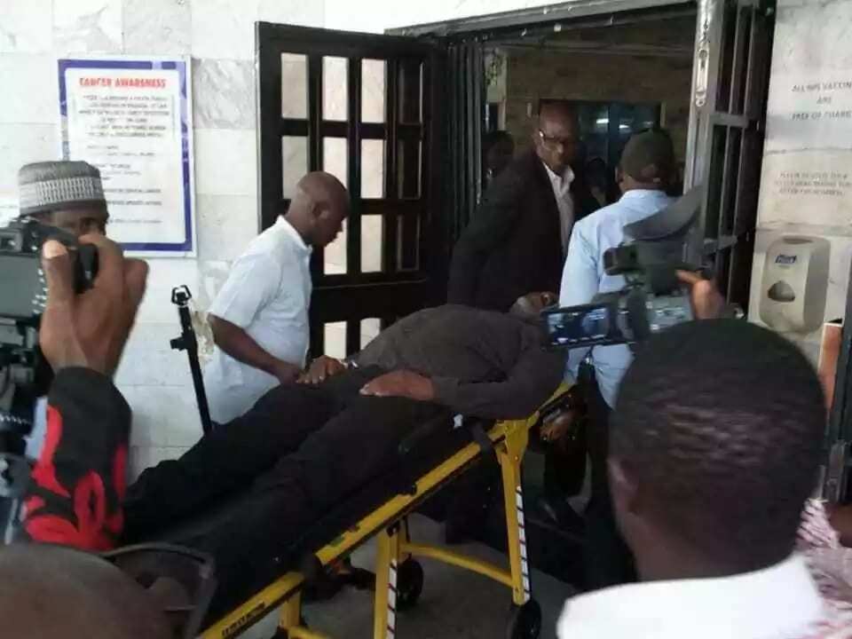 Breaking: Senator Dino Melaye reportedly jumps off police van, lands in hospital (photos)