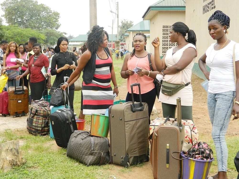Female corps member arrive at NYSC camp