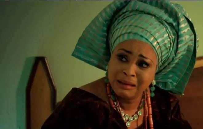 Actress Bukky Wright crying in a movie