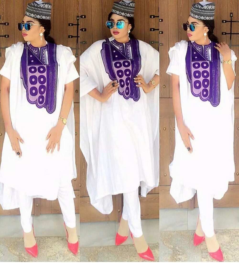 White Agbada style for ladies with lilac ornament