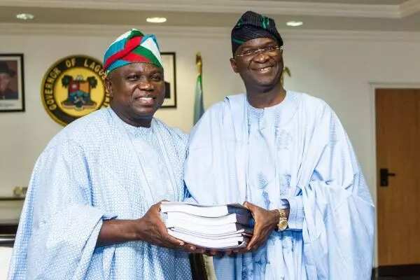 PHOTOS: Ambode Receives Hand-Over Notes From Fashola