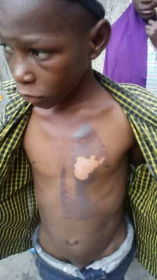 Lady burns nephew with hot iron on the chest for stealing (photo)