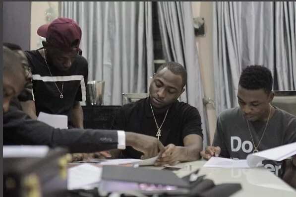 Davido officially signs two new artists