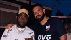 Canadian rapper Drake poses for pictures with Nigerian star Davido
