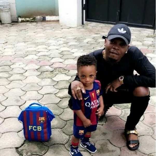 Olamide son and wife