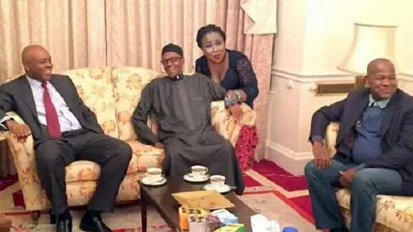Image result for That photo shopped image of a lady sitting on the lap of Buhari