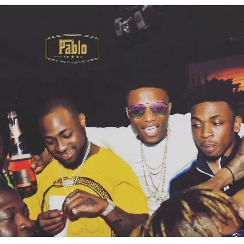 Davido and Wizkid hang out in the club together after settling beef