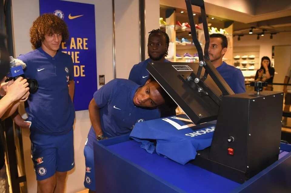 Chelsea stars print their own champions shirt in China