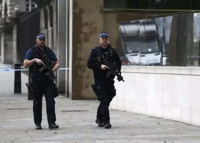 British police arrest 7 in probe into attack on parliament