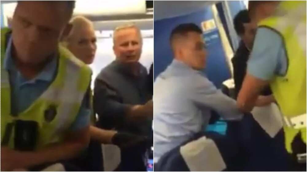 Nigerians flying from Amsterdam to Lagos stop the deportation of a Nigerian in handcuffs (photos, video) Nigerians flying from Amsterdam to Lagos stop the deportation of a Nigerian in handcuffs (photos, video)