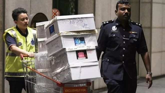 Police seize cash and luxury goods from property of former Malaysian PM