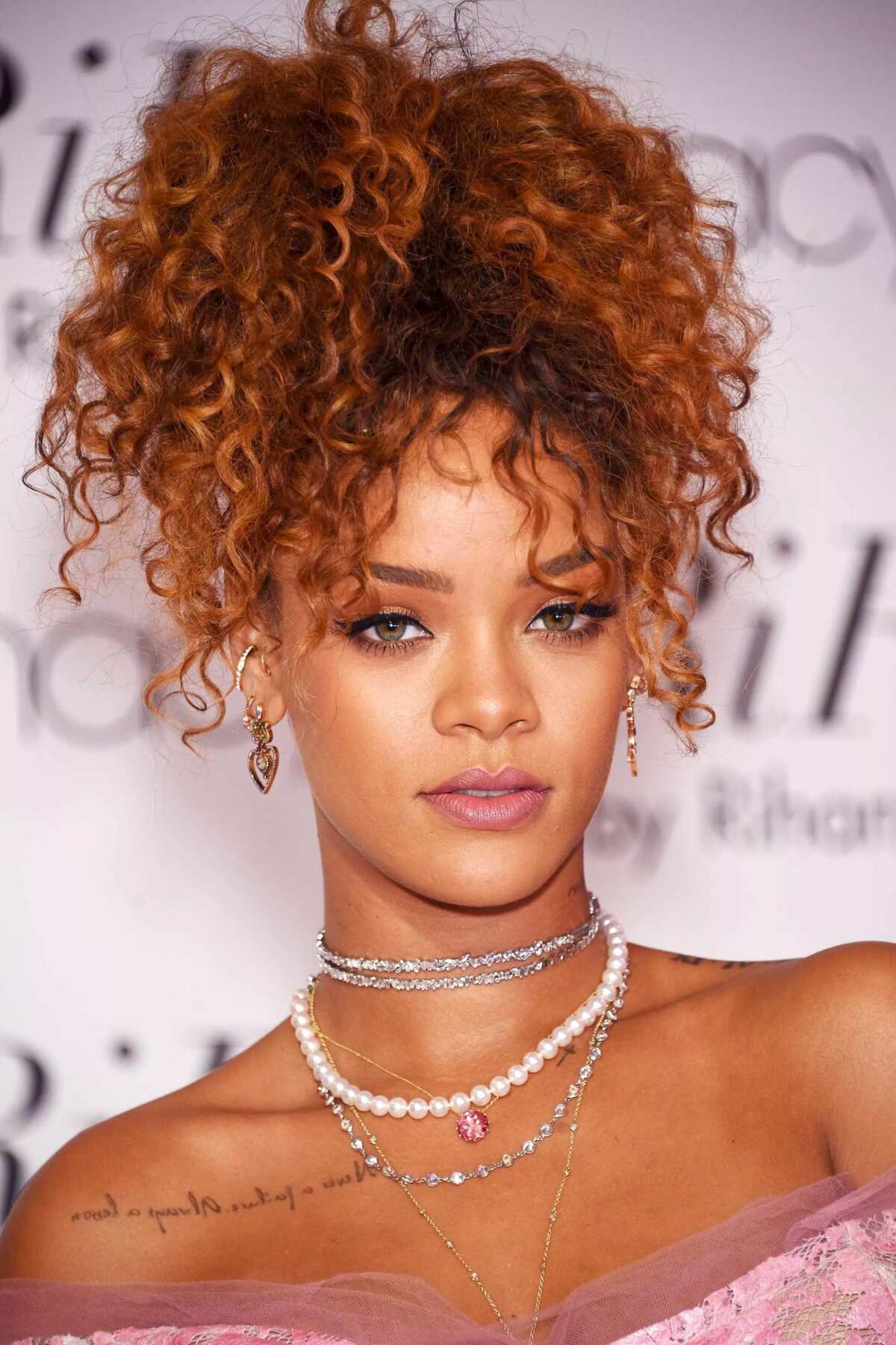 top rihanna’s hairstyles short curly hair and braids